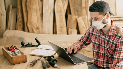 carpenter with laptop